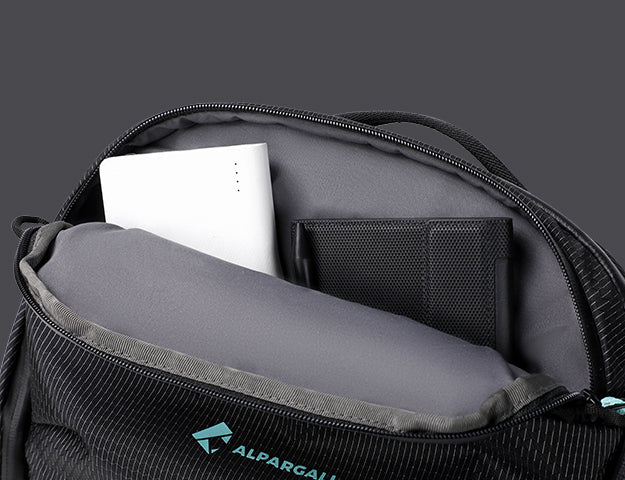 Top front pocket of everyday carry backpack with padded interior