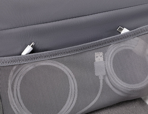 Interior mesh pockets in clamshell backpack for cables and accessories